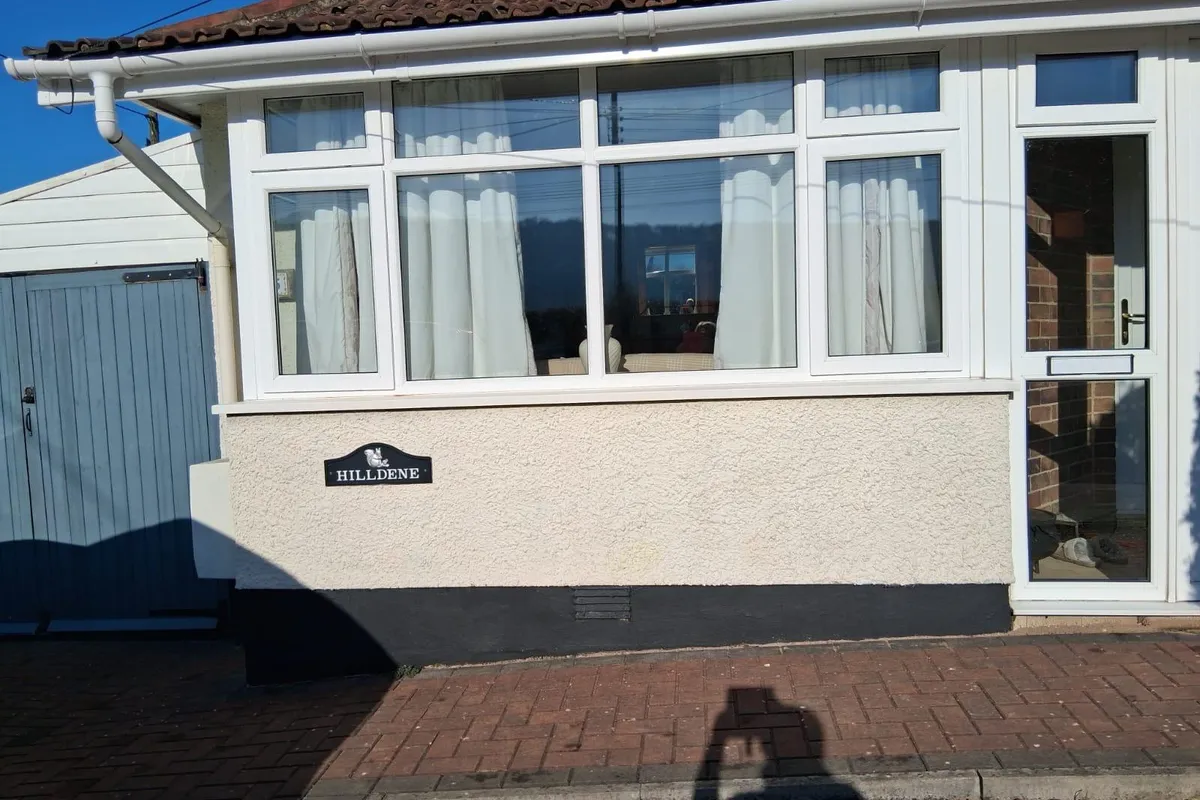 A full run of new white UPVC windows and a glazed door fitted to a bungalow by Window And Door Doctor