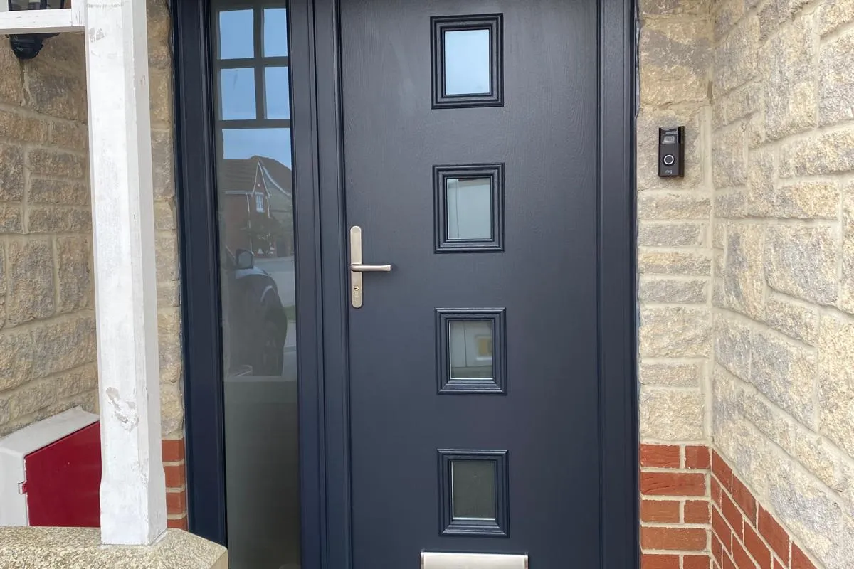 Anthracite composite front door with matching side panel, fitted by Window And Door Doctor