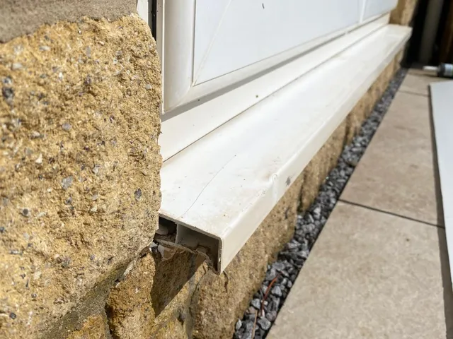 Before: Damaged external sill re-capped and resealed: a neat repair, no new window needed.